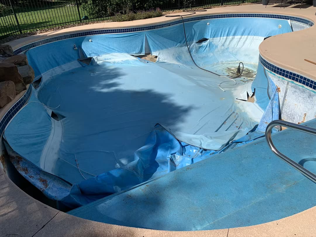 Damaged pool area before